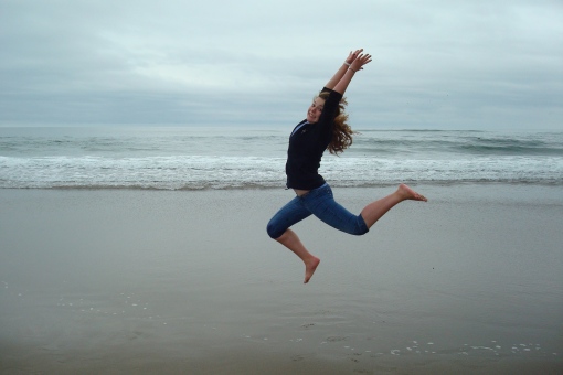 Hoob showing a dance move on the beach in Oregon.